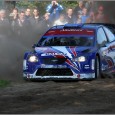 Eén Belg tegen tien Nederlanders in Hellendoornrally Economische crisis in de wereld? Aan het deelnemersveld van de Schutte Informatisering Hellendoorn Rally is het niet te zien. Liefst twaalf moderne World Rally Cars staan er vrijdag 18 september...